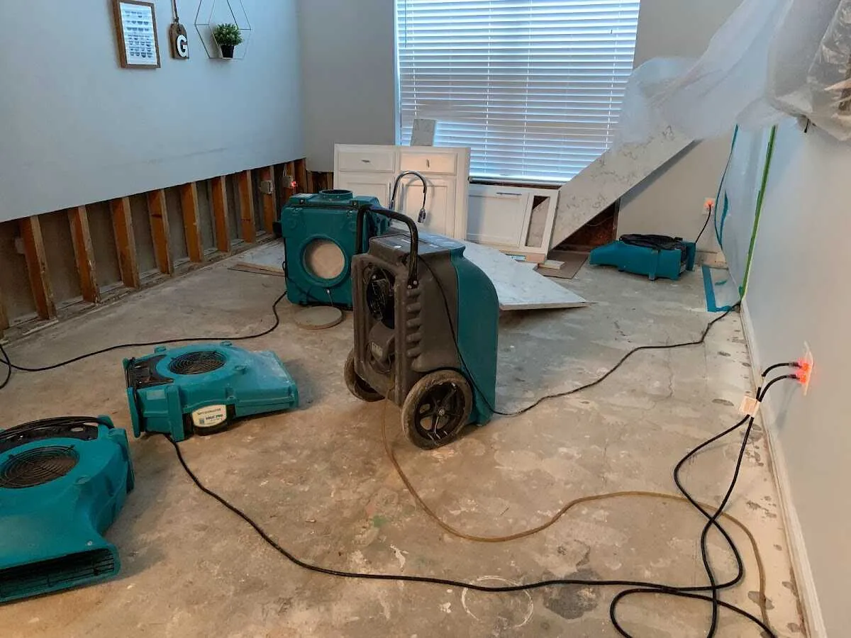 Dehumidifier in flood-cut room for Water Damage Restoration in Poland